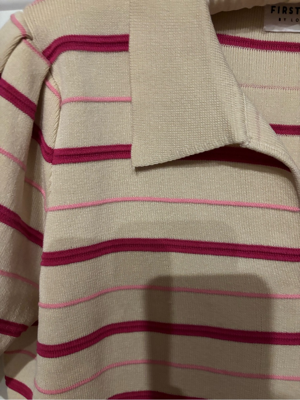 First Love Beige Polo with Pink Stripe Detail.